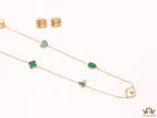 Emerald green clover heart and other shape charms on a sleek long gold plated chain with matching studs