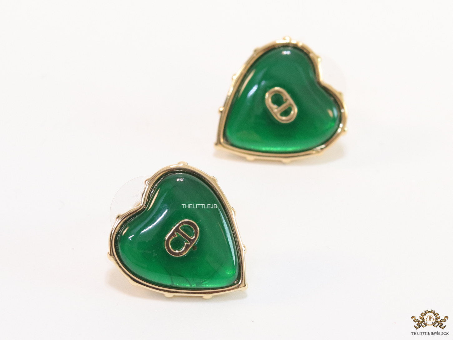 Heart shape green stud earrings with golden alphabets