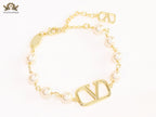 Alphabet V Gold pearl link chain bracelet