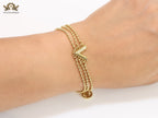 Alphabet V triple layered gold bracelet