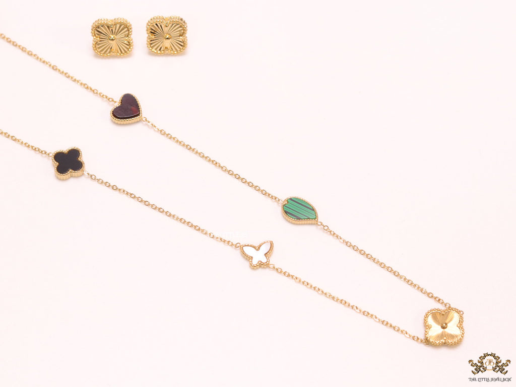 Multi colour clover heart and other shape charms on a sleek long gold plated chain with matching studs