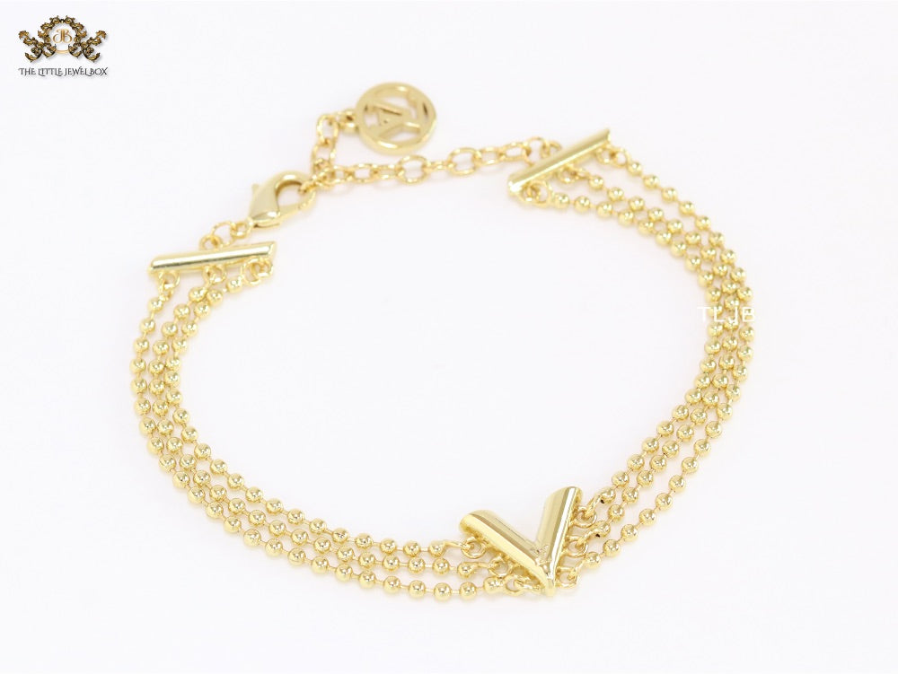 Alphabet V triple layered gold bracelet