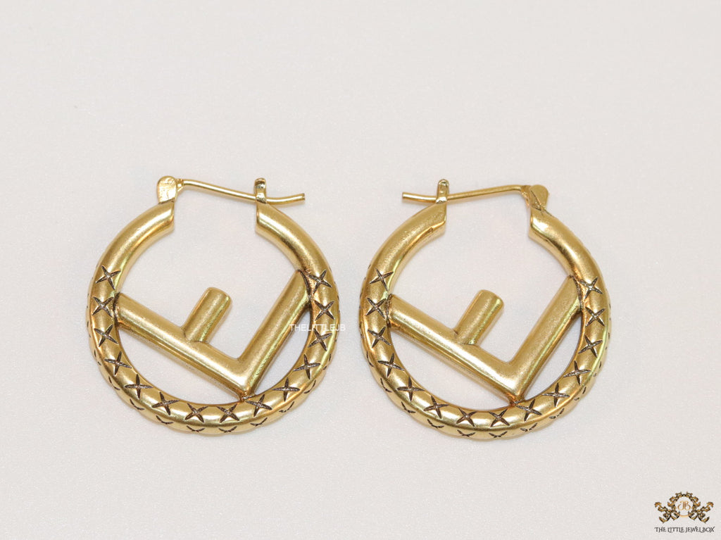 Designer golden hoops with alphabet motif