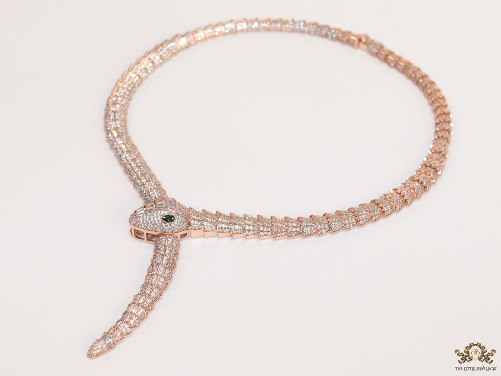 Rose Gold plated cubic zirconia stones ancient serpentine symbol necklace with matching studs