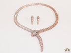 Rose Gold plated cubic zirconia stones ancient serpentine symbol necklace with matching studs