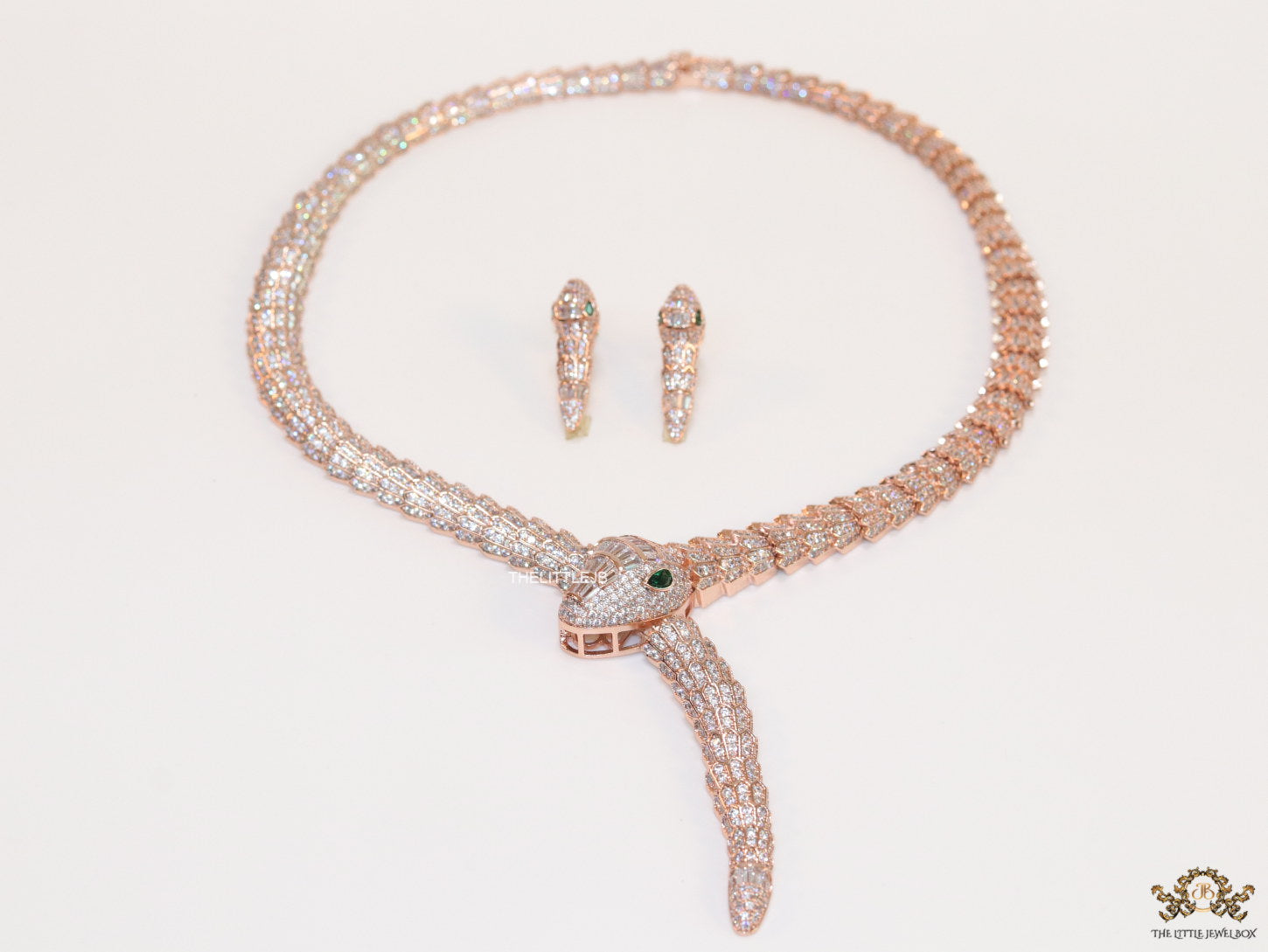 Rose Gold plated cubic zirconia stones ancient serpentine symbol necklace with matching studs