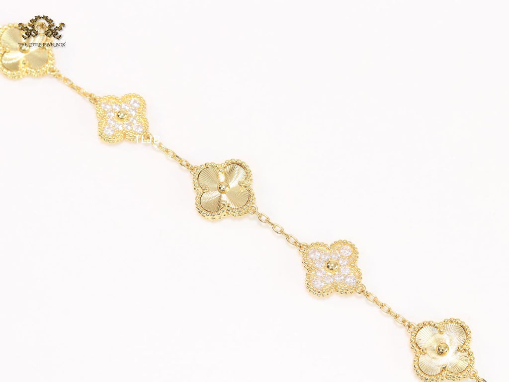 Cz and gold clover bracelet