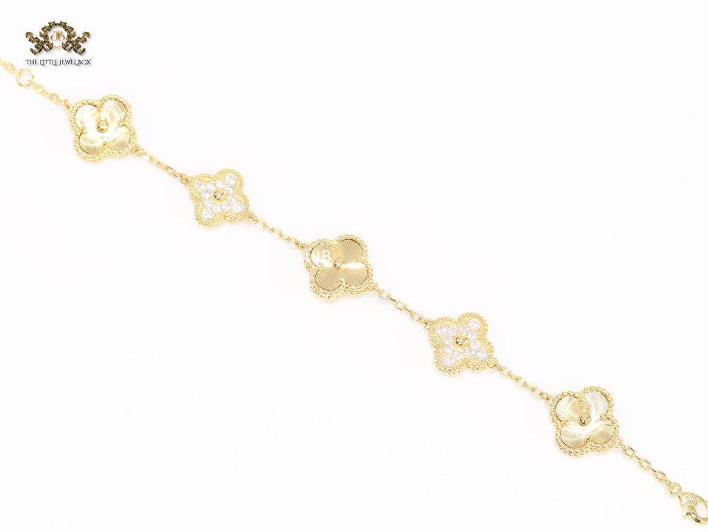 Cz and gold clover bracelet