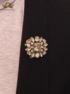 Double G brooch with uncut stones