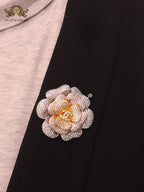 Double C platinum cz brooch with pink coloured details