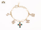 Pale Gold charms double c bracelet