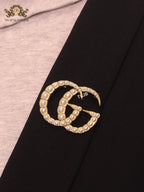 Double G pearl & gold brooch