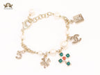 Pale Gold charms double c bracelet