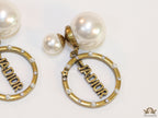 Gold plated pearl bomber earrings with alphabets