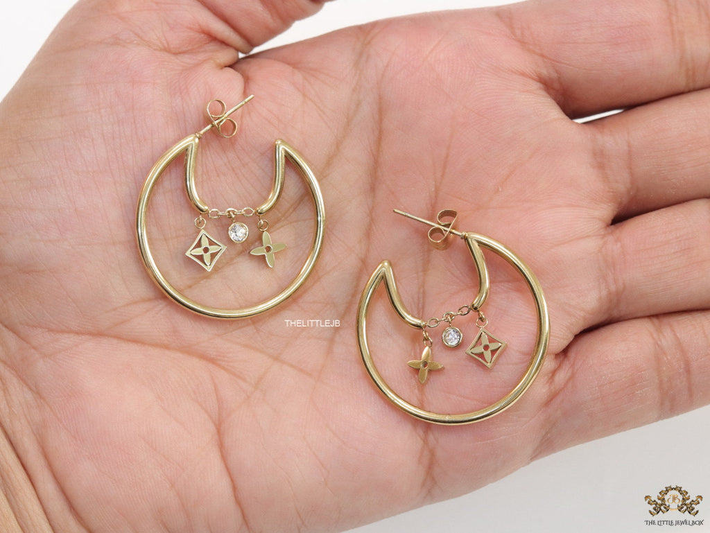 Designer golden hoops with various charms