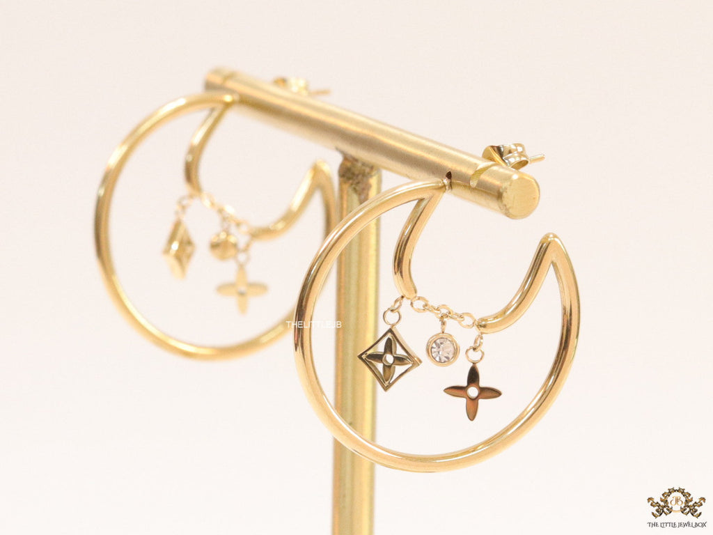 Designer golden hoops with various charms