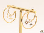 Designer golden hoops with various charms
