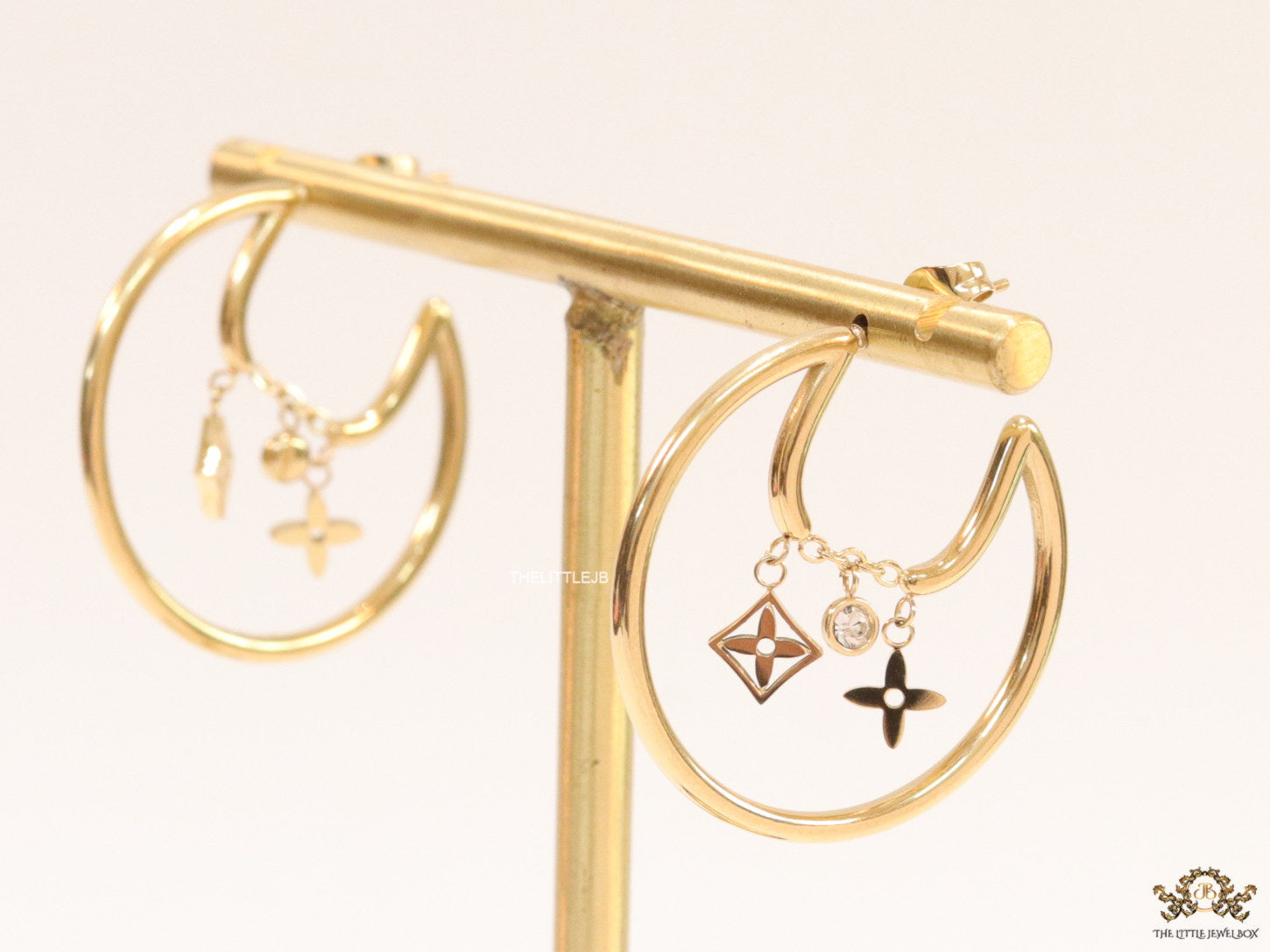 Designer golden hoops with various charms