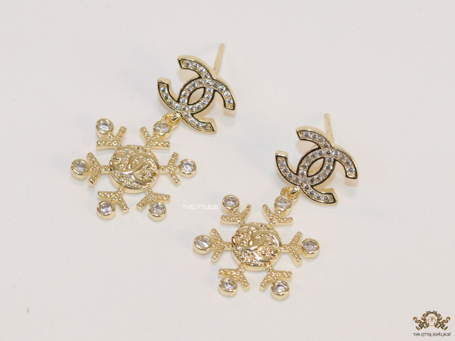 Twin C motif fancy cz earrings