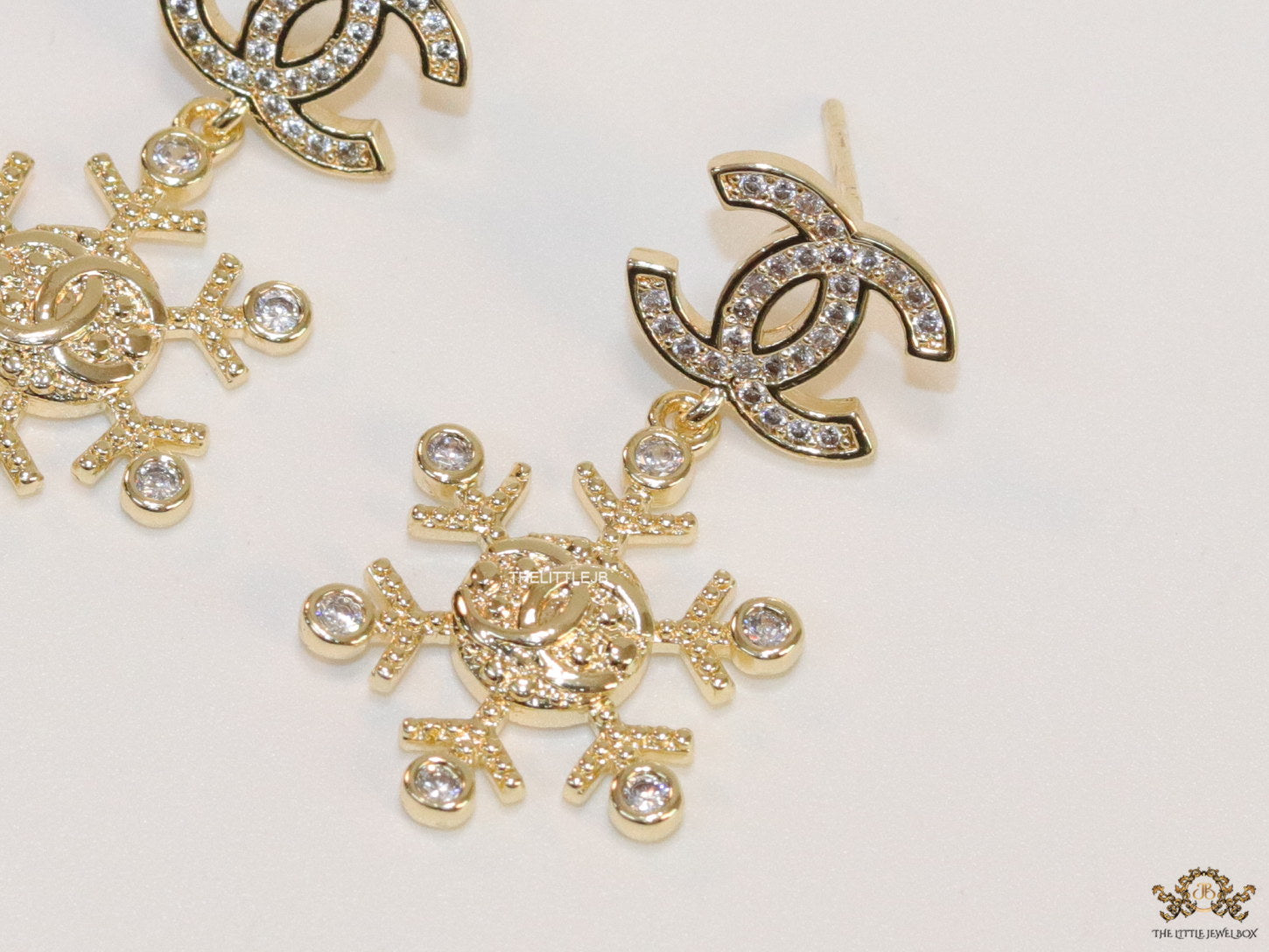 Twin C motif fancy cz earrings