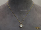 Clover shaped cz evil eye necklace in gold plating
