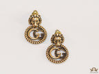 Lion head twin G earrings in gold finish