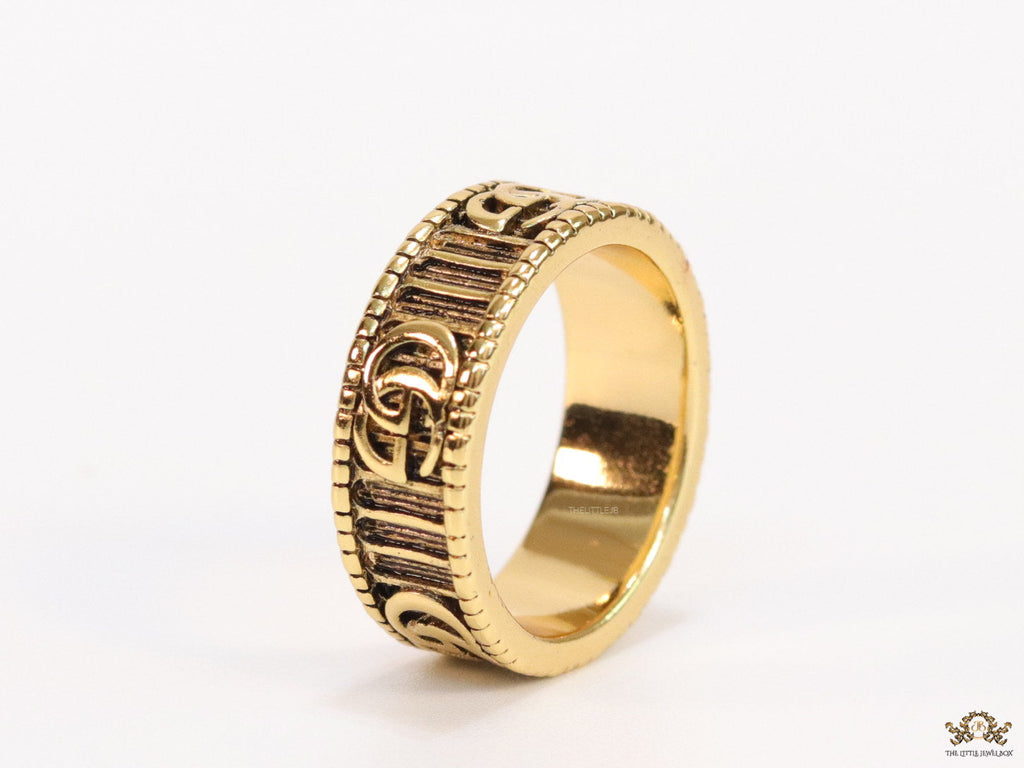 Double G ring band in antique gold finish