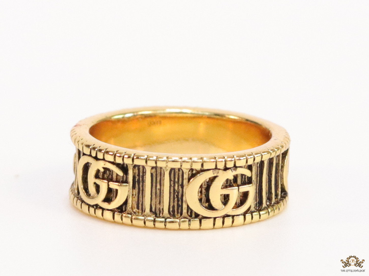 Double G ring band in antique gold finish