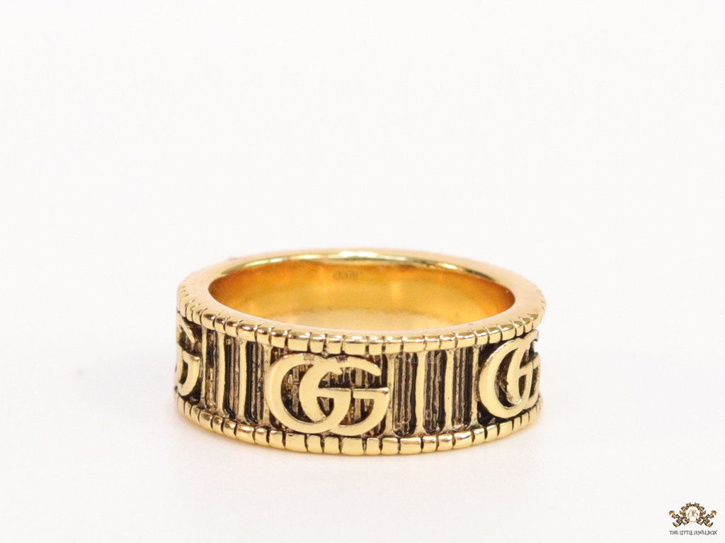 Double G ring band in antique gold finish