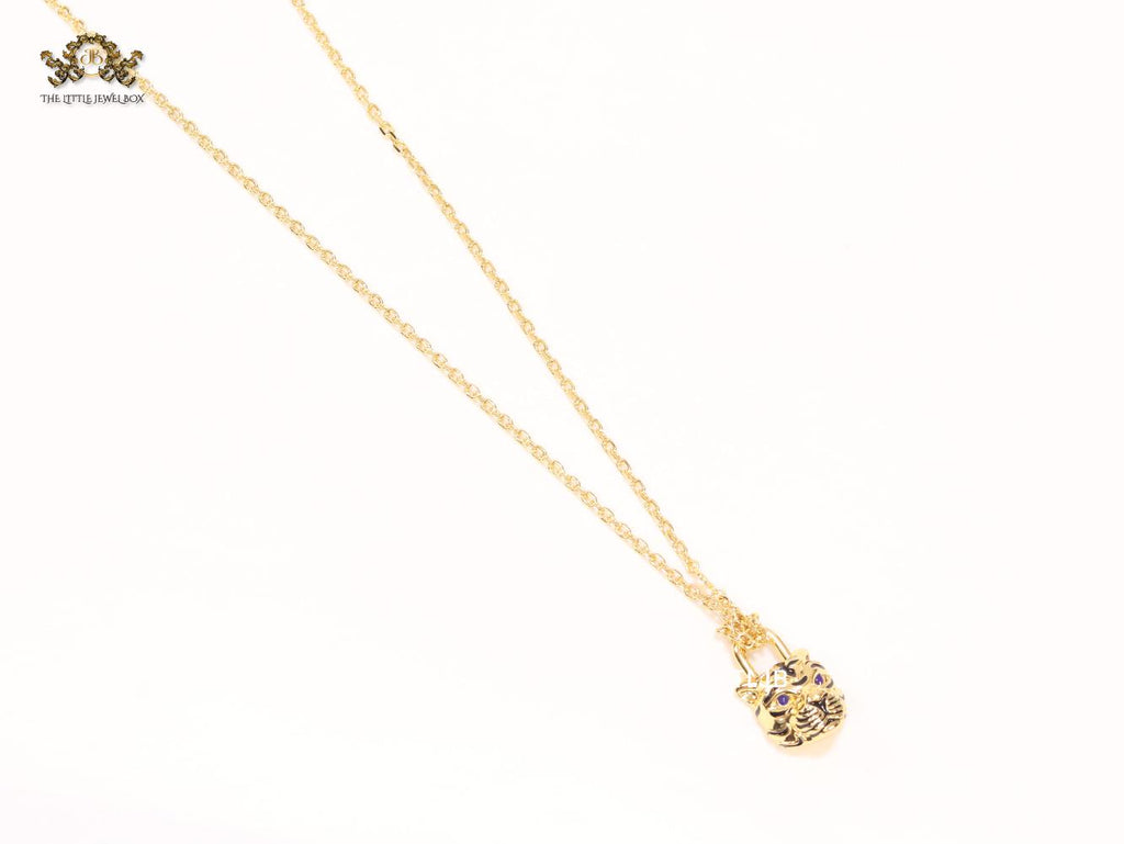 Sleek panther face gold chain