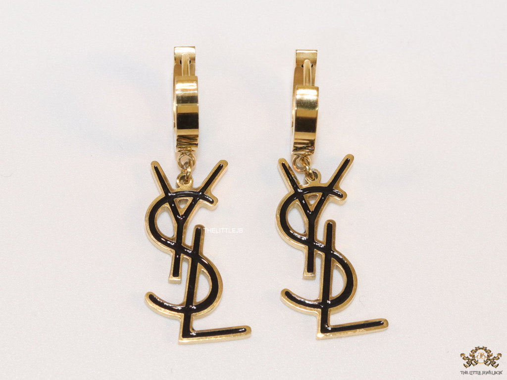 Tiny alphabet earrings in golden and black finish