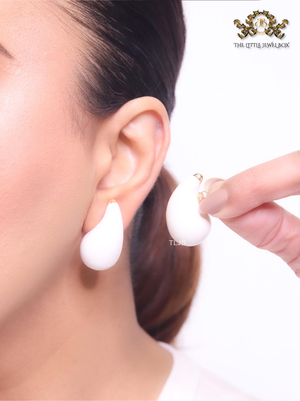 Teardrop white enamel studs