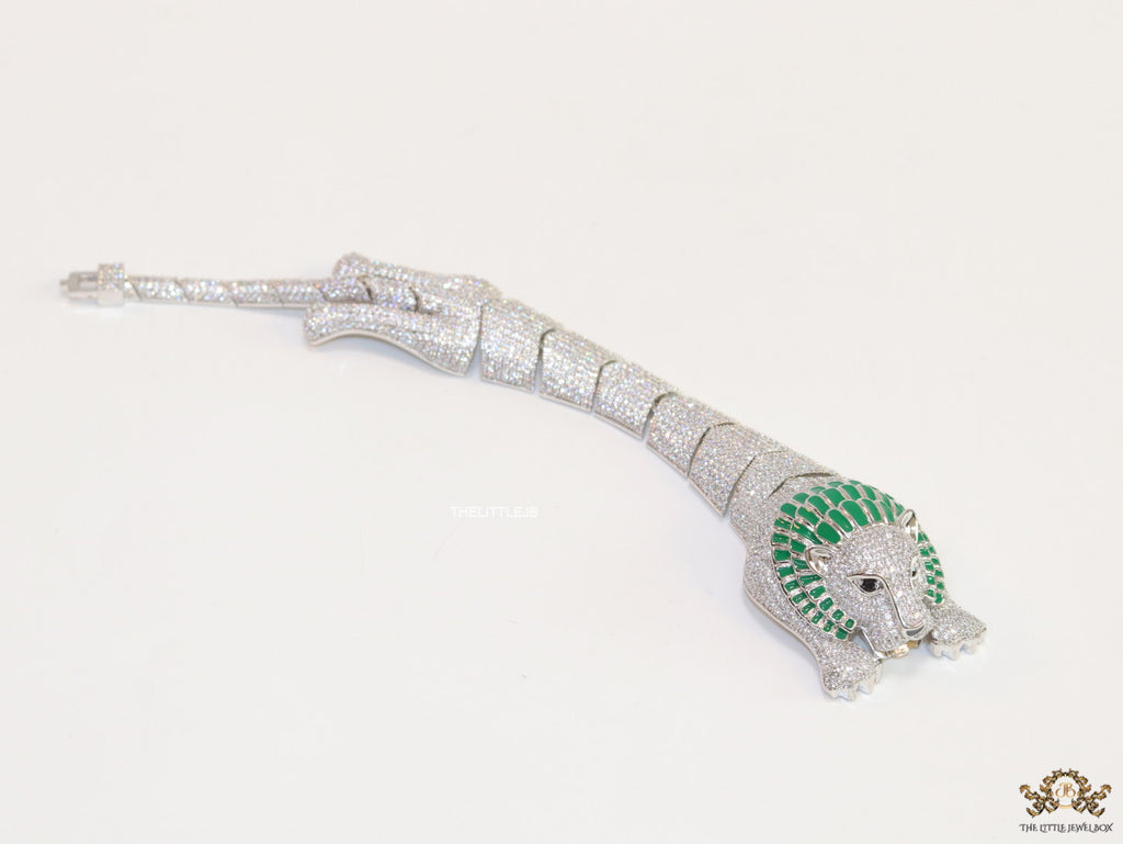 Platinum plated unique panther bracelet with cz and emerald green stones