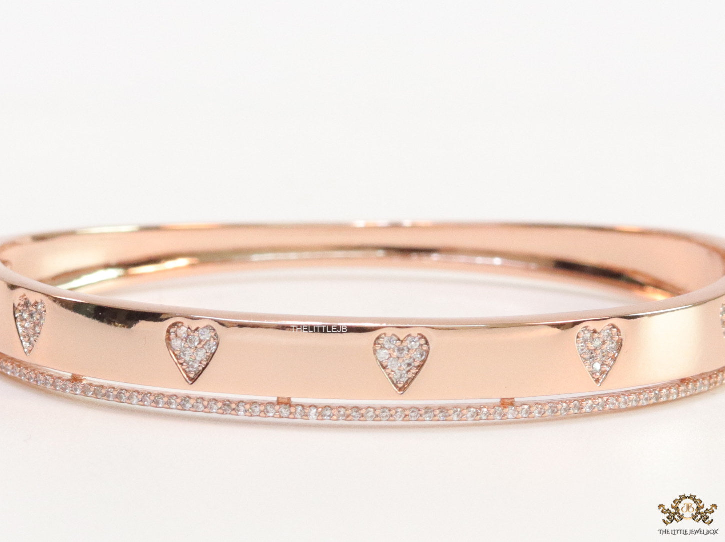 Rose gold bracelet with cz hearts and single line cz