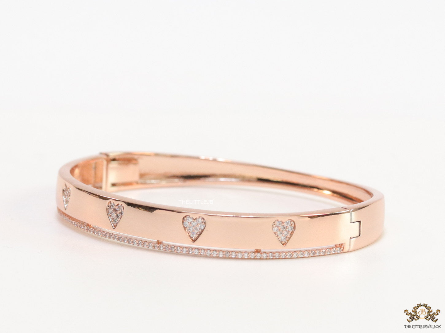 Rose gold bracelet with cz hearts and single line cz