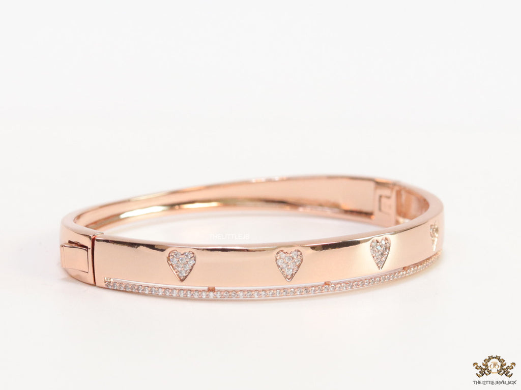 Rose gold bracelet with cz hearts and single line cz