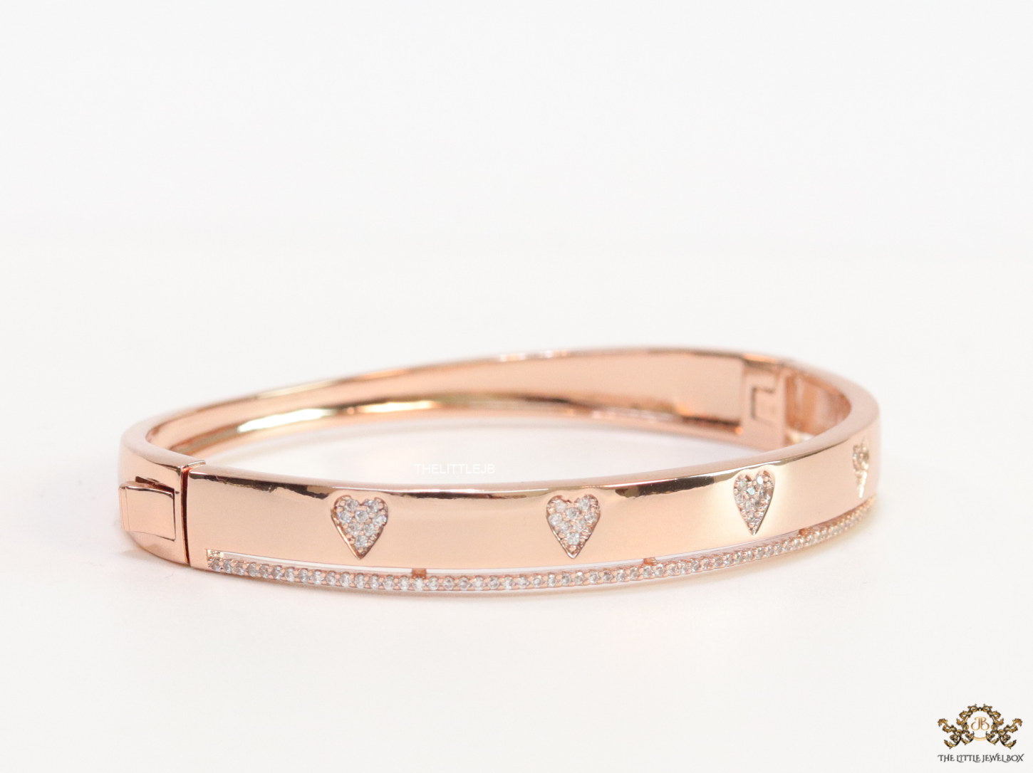 Rose gold bracelet with cz hearts and single line cz