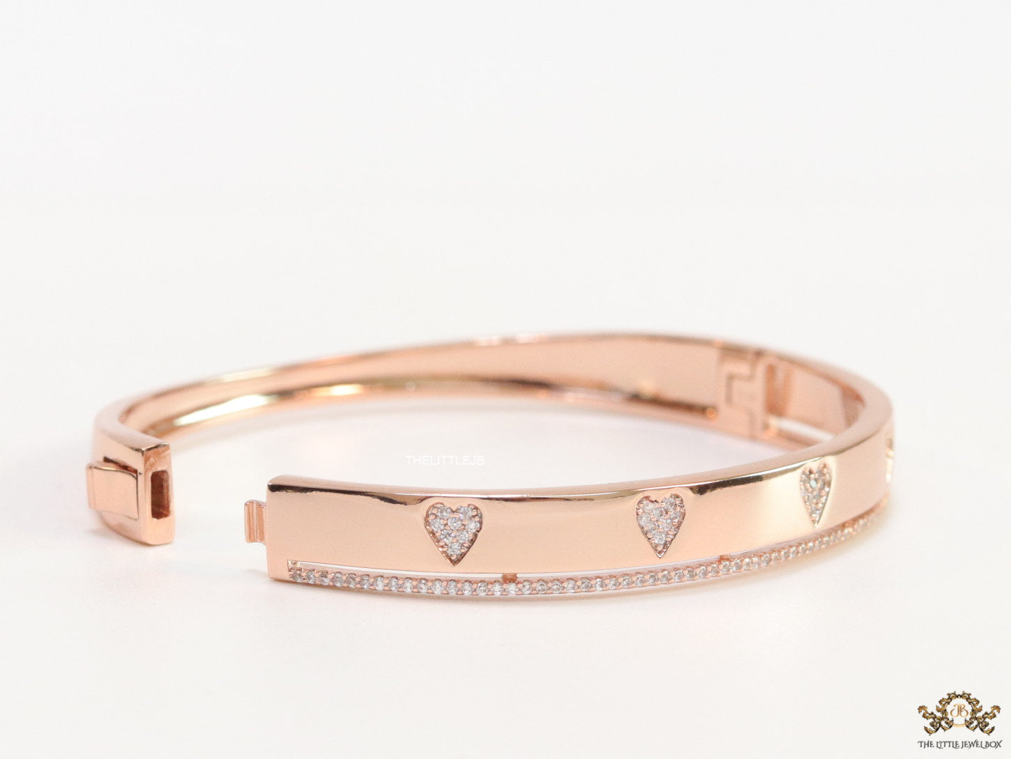 Rose gold bracelet with cz hearts and single line cz