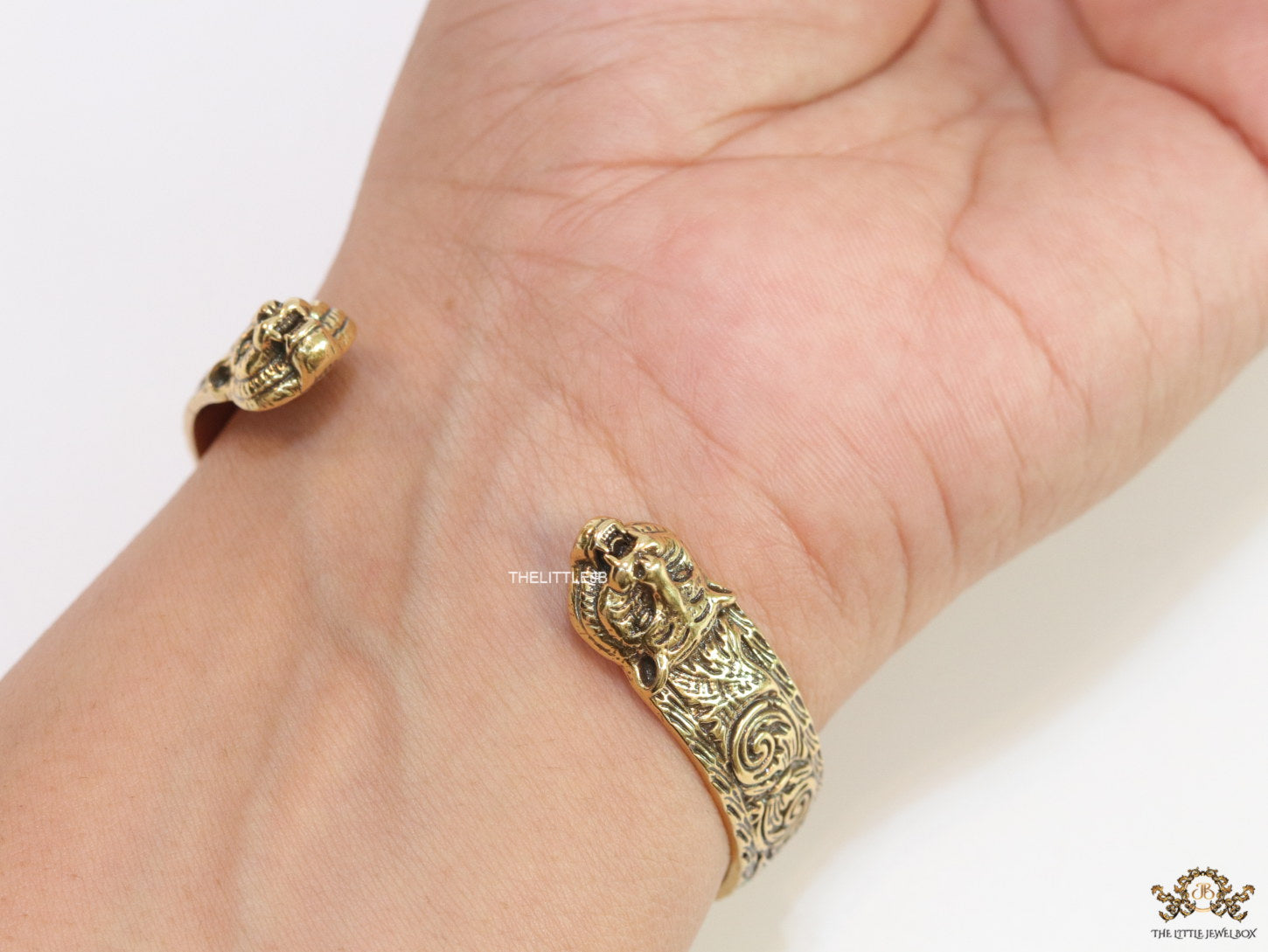 Embossed bracelet band in antique gold finish