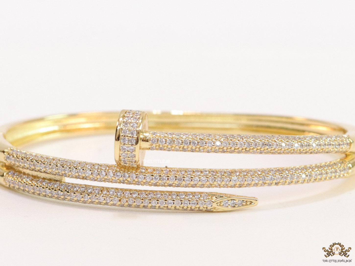 Gold plated layered nail bracelet