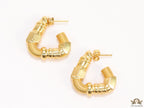 Gold plated open twisted screw shape earrings with numeric inscription