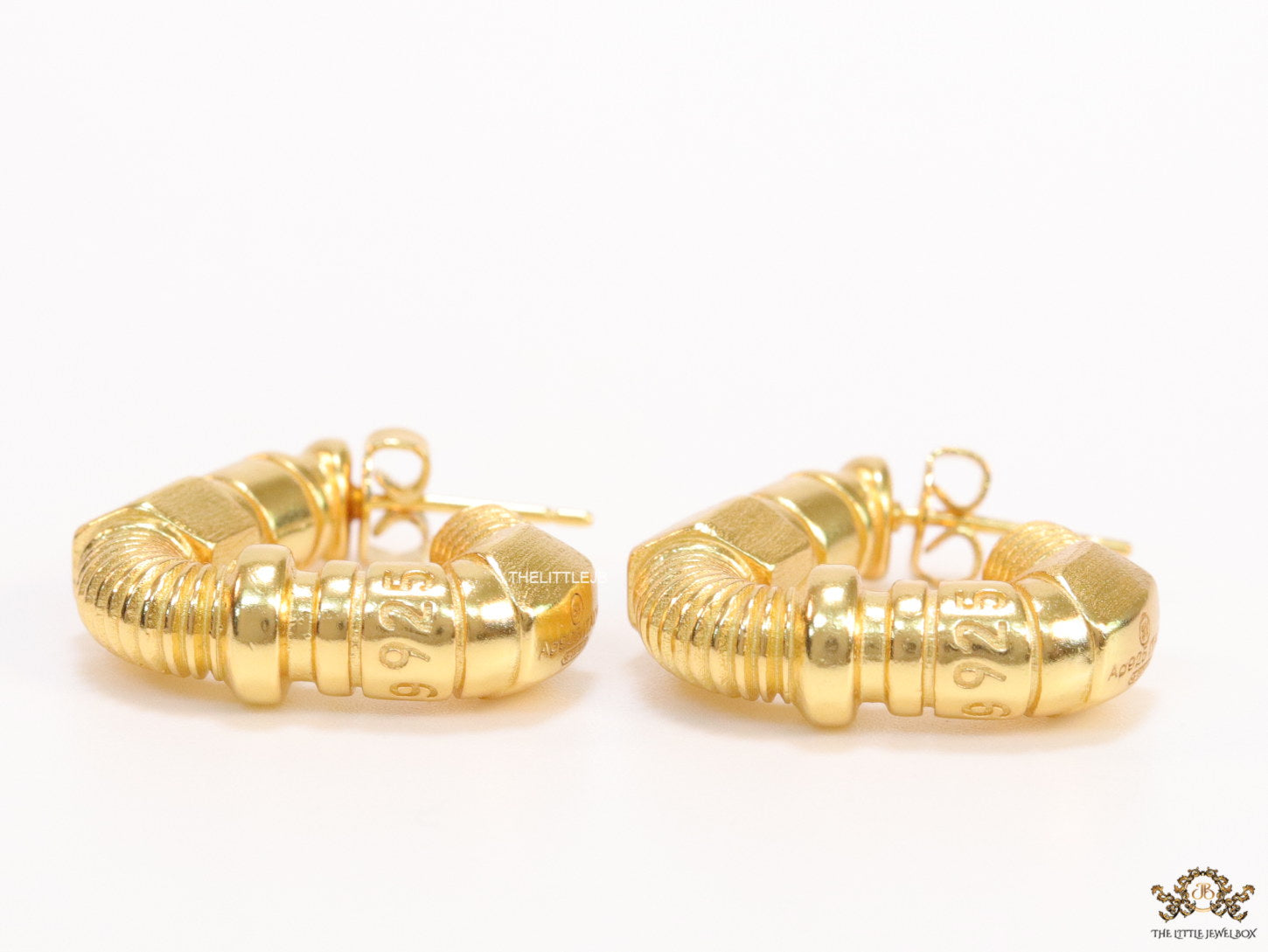 Gold plated open twisted screw shape earrings with numeric inscription