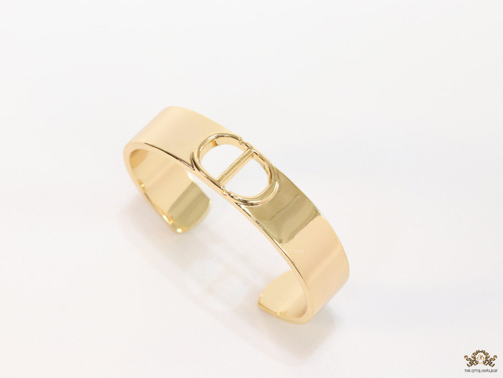 Broad Gold plated bracelet with C and D alphabet