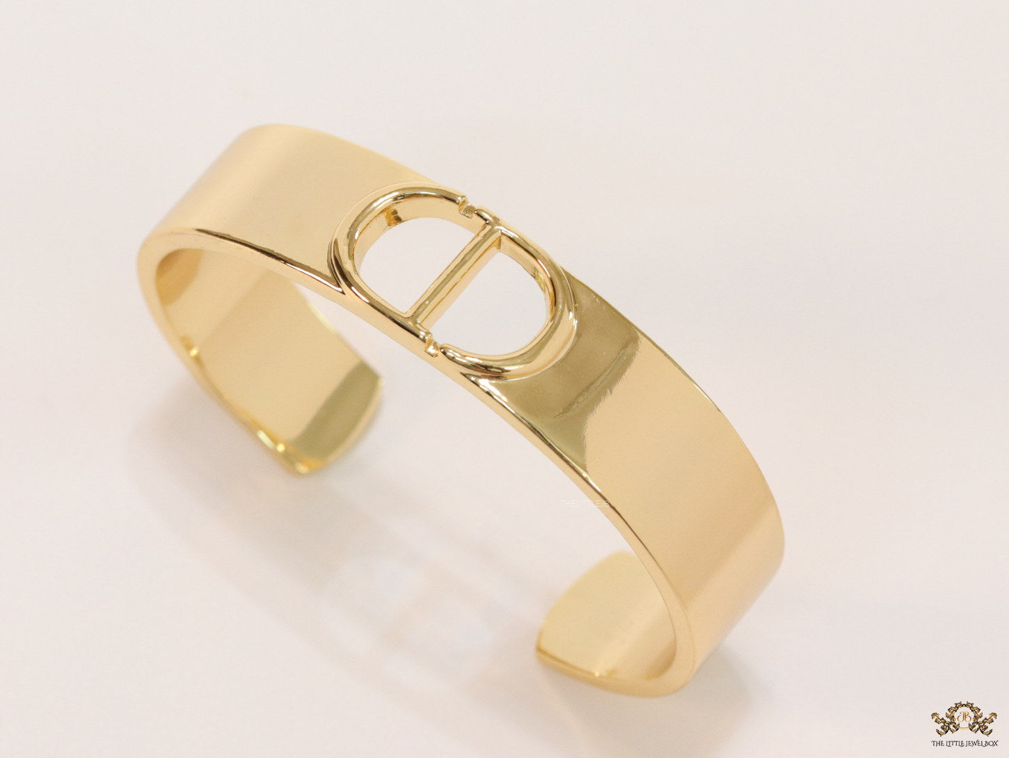 Broad Gold plated bracelet with C and D alphabet