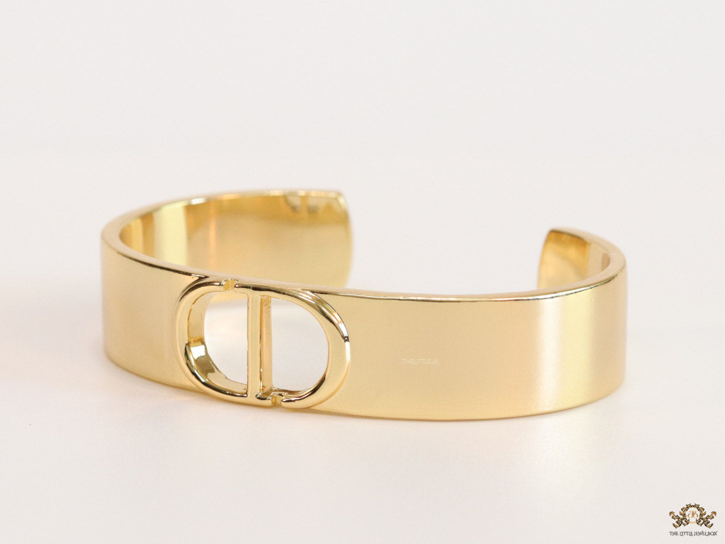 Broad Gold plated bracelet with C and D alphabet