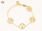 Alphabet L&V sleek gold chain bracelet