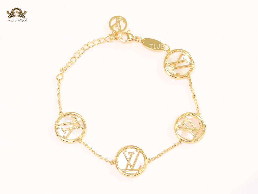 Alphabet L&V sleek gold chain bracelet