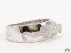 Broad band platinum bracelet with cz panther motif