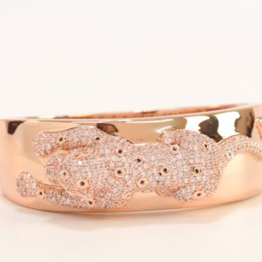 Broad band rose gold bracelet with cz panther motif