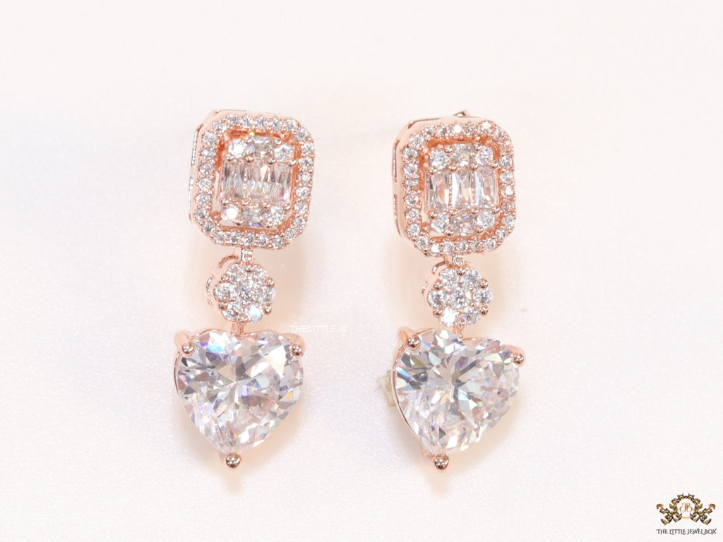 Rose gold Cz baguette earrings with heart shape cz drop